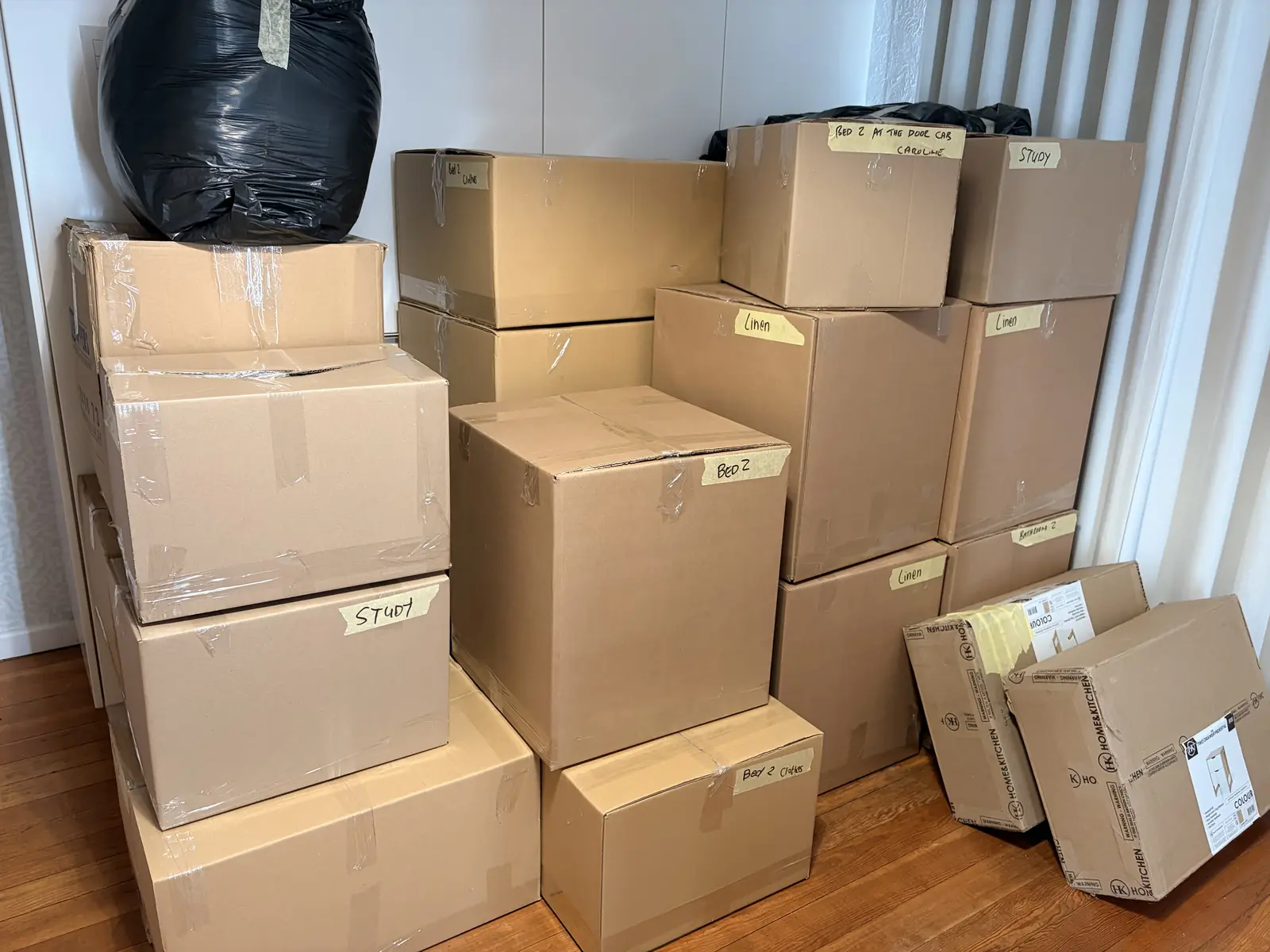 Boxes stacked, labeled, and ready to go